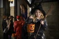 Halloween Party With Children Trick Or Treating In Costume Royalty Free Stock Photo