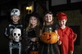 Halloween Party With Children Trick Or Treating In Costume Royalty Free Stock Photo