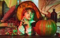 Halloween party with children wearing Halloween costumes. Cheerful child with pumpkins and candy. Children in America Royalty Free Stock Photo