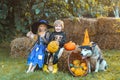 Halloween party with children wearing Halloween costumes. Happy Halloween Cute children daughter and son making funny Royalty Free Stock Photo