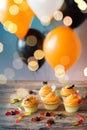 Halloween party cupcakes and candies on table Royalty Free Stock Photo