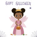 Halloween party. Cute African American girl dressed as a fairy princess with wings and a crown, holding a pumpkin with Royalty Free Stock Photo