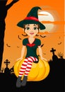 Halloween party with cute witch sitting on pumpkin agains greeting card with pumpkins, bats and tombstone Royalty Free Stock Photo