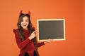 Halloween party. Remember the ghoul times. Little girl cute horns Halloween advertisement. Child imp hold blackboard