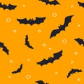 Halloween pattern with bats on orange background. Seamless vector hand drawn halloween set.