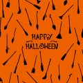 Halloween pattern seamless with witch brooms silhouette on orange background