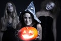 Halloween personages over dark background