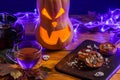 Halloween photo table with pumpkin, biscuits, maple leaves, Royalty Free Stock Photo