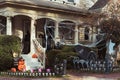 Halloween porch decorations celebrating the spooky season with ghosts, goblins, and a graveyard