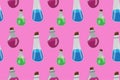 Halloween potions in jars on a pink background pattern