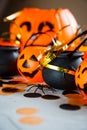 Halloween preparation. Decorative orange lantern pumpkins stay on a gray grunge background. head jack lantern. Halloween