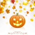 Halloween Pumpkin on a Background of Falling Autumn Leaves Royalty Free Stock Photo