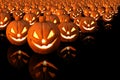 Halloween pumpkin with burning candles on black background Royalty Free Stock Photo