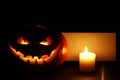 Halloween pumpkin, candle and card