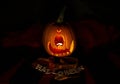 Halloween Pumpkin in dark atmosphere. Horror Cult icon. Scary face