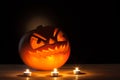 Halloween pumpkin on dark background.