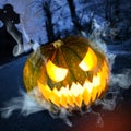 Halloween pumpkin in dark forest at night Royalty Free Stock Photo