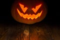 Halloween pumpkin dark light candle Royalty Free Stock Photo