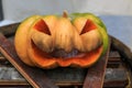 Halloween pumpkin decoration on a barrel Royalty Free Stock Photo