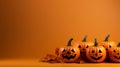 Halloween pumpkin decorations on a yellow-orange background with copy space. Royalty Free Stock Photo