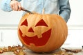 Halloween pumpkin with dry leafs Royalty Free Stock Photo