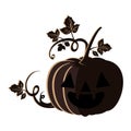 Halloween pumpkin with face and leafs Royalty Free Stock Photo