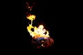 Halloween pumpkin on fire isolated on a black background Royalty Free Stock Photo