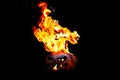 Halloween pumpkin on fire isolated on a black background Royalty Free Stock Photo