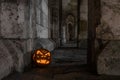 Halloween pumpkin in front of ancient stone wall of a church, Germany Royalty Free Stock Photo