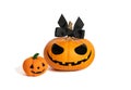Halloween pumpkin girl with little wool pumpkin. Jack o Lantern Lady pumpkin with black bow isolated on a white background