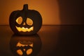 Halloween pumpkin glow on a dark background