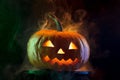 Halloween pumpkin head jack lantern with scary evil face Royalty Free Stock Photo