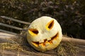 Halloween pumpkin jack lantern on a pitchfork