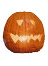 Halloween pumpkin lantern with carved face glowing inside for festive decoration Royalty Free Stock Photo