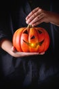 Halloween Pumpkin lantern in child's hands