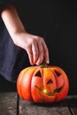 Halloween Pumpkin lantern in child's hands