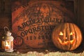 Halloween pumpkin with lantern and ouija board