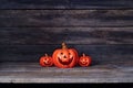 Halloween pumpkin lantern. Trick or treat on a wooden table Royalty Free Stock Photo