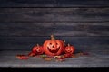 Halloween pumpkin lantern. Trick or treat on a wooden table Royalty Free Stock Photo