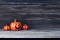 Halloween pumpkin lantern. Trick or treat on a wooden table Royalty Free Stock Photo