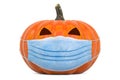 Halloween pumpkin with medical mask. 3D rendering