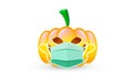 Halloween pumpkin in medical mask