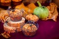 Halloween Pumpkin Muffins Decorated with Spiders and Spider Web Royalty Free Stock Photo