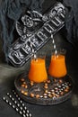 Halloween pumpkin orange cocktails in glass