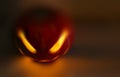 Halloween pumpkin with scary face and light candle in it. Lantern. Royalty Free Stock Photo