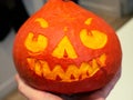 Halloween pumpkin with a scary sharp-toothed face