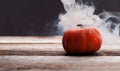 Halloween pumpkin with smoke and light in the dark night Royalty Free Stock Photo