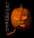 Halloween pumpkin with smoke pipe a Royalty Free Stock Photo