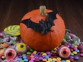 Halloween pumpkin with bat and candy stock images Royalty Free Stock Photo