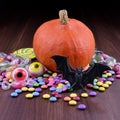 Halloween pumpkin with bat and candy and stock images Royalty Free Stock Photo